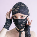 A handmade black mask that only reveals the eyes.74
